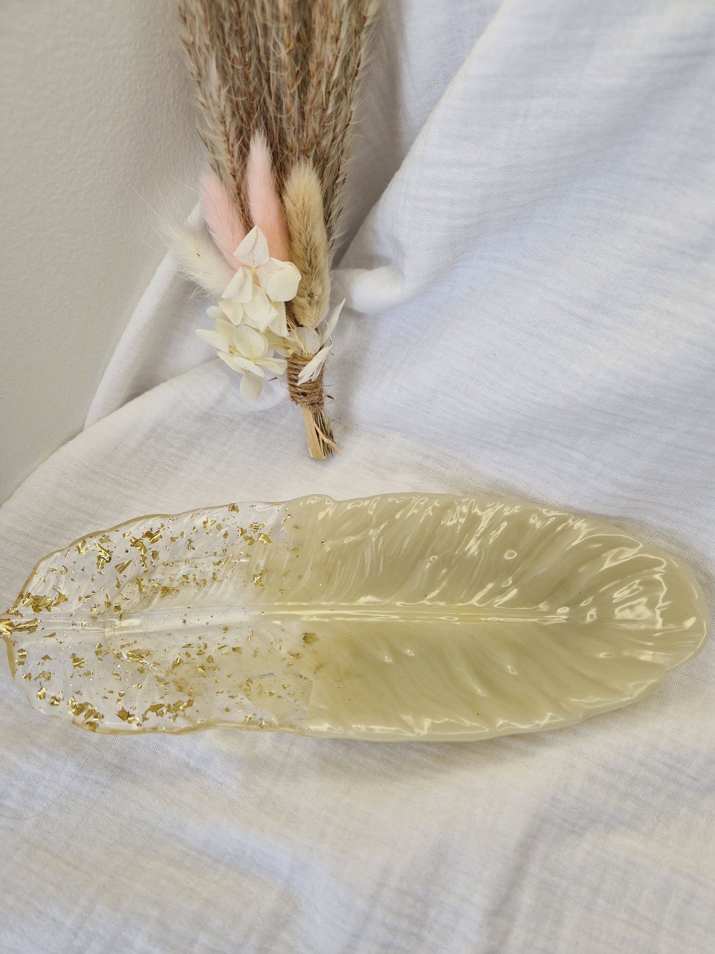 Vide poche grande plume