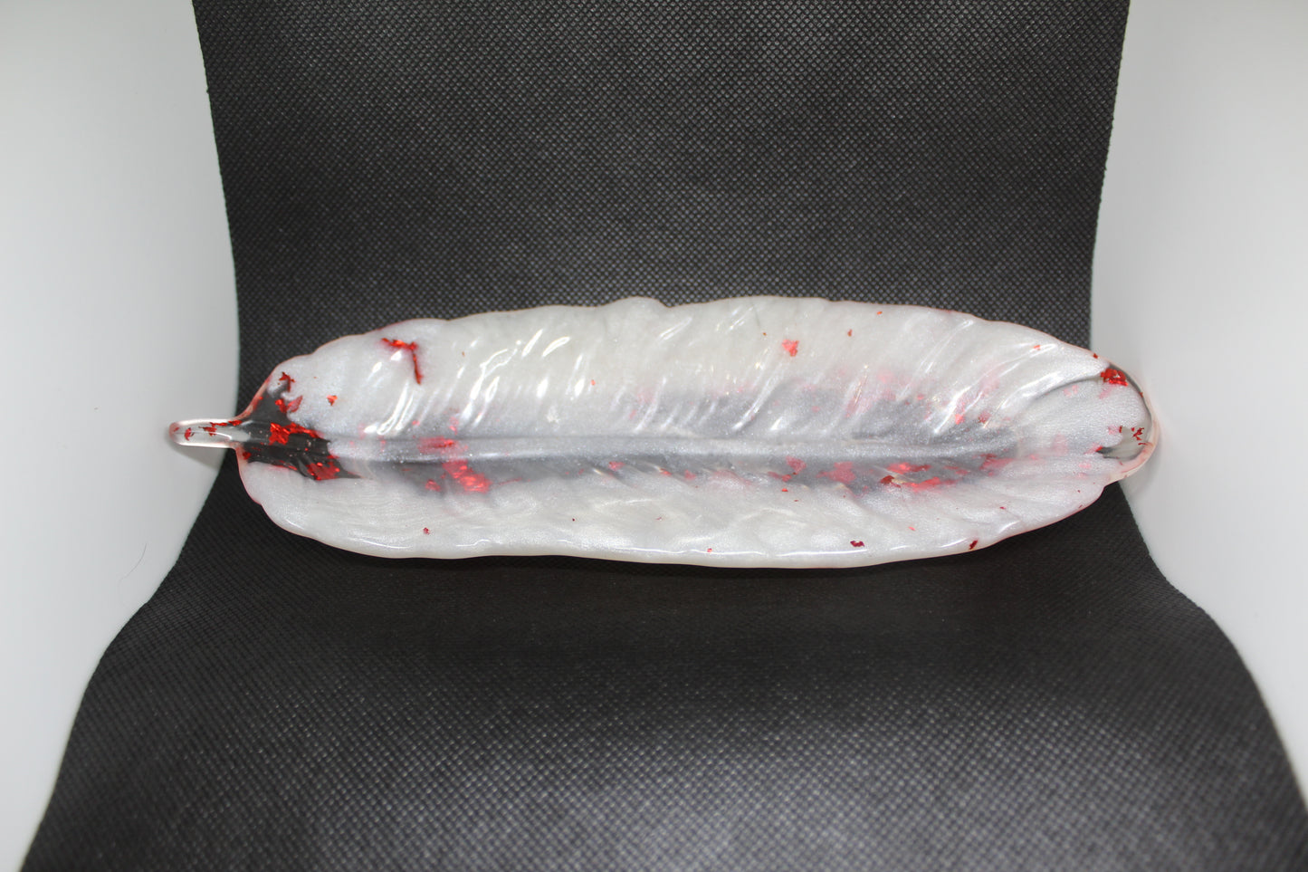 Vide poche grande plume